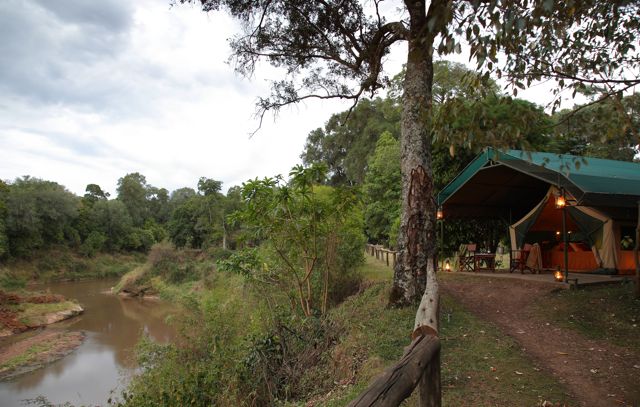 Luxury riverfront tent at Governors’ Camp in Masai Mara, offering exclusive safari accommodation