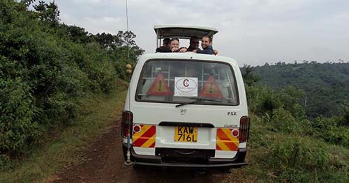 Safari minivan ready for a Nairobi National Park tour with Cruzeiro Safaris Kenya